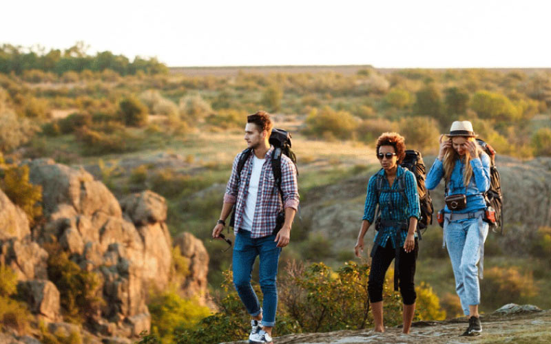 Group enjoying a scenic hike near Adelaide with the help of bus hire transportation