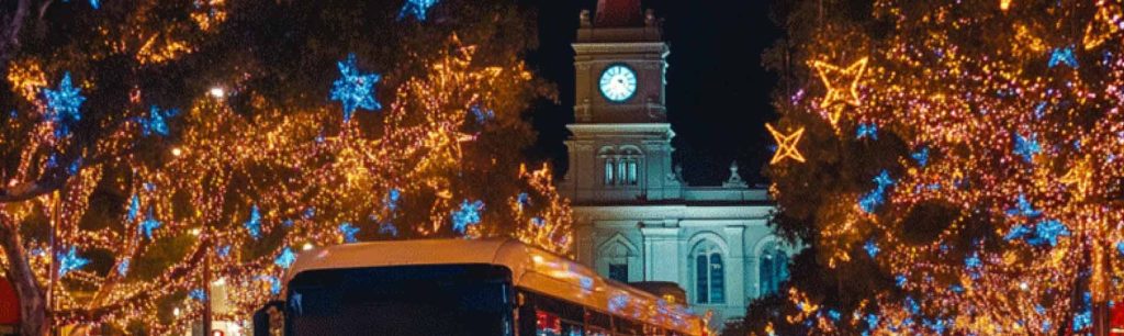 Holiday tour bus exploring Christmas lights in Adelaide" Adelaide Christmas, November 2024, Australia